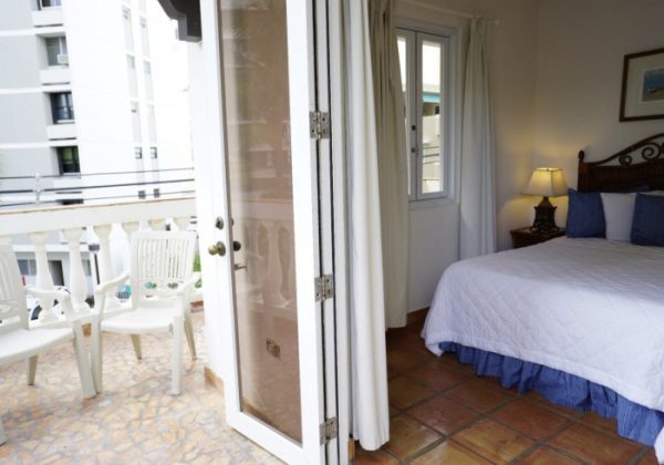 Double King Room at Acacia Boutique Hotel with two king-sized beds and modern decor.