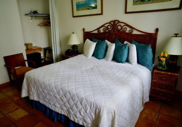 Accessible King Deluxe Room at Acacia Boutique Hotel featuring spacious layout and comfortable amenities.